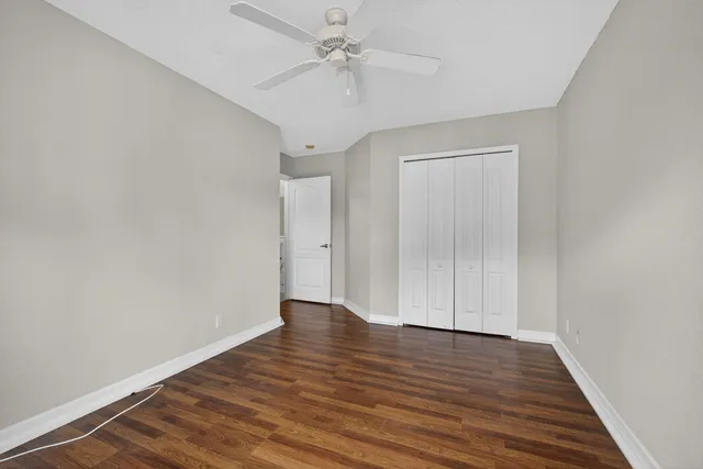 an aerial view of a pool table and chairs