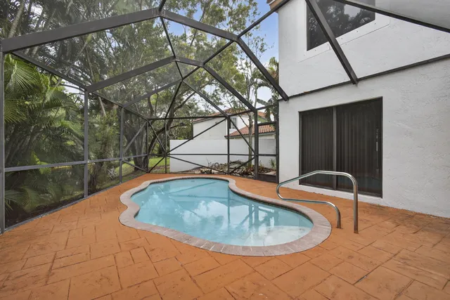 a view of a park with swings and slides