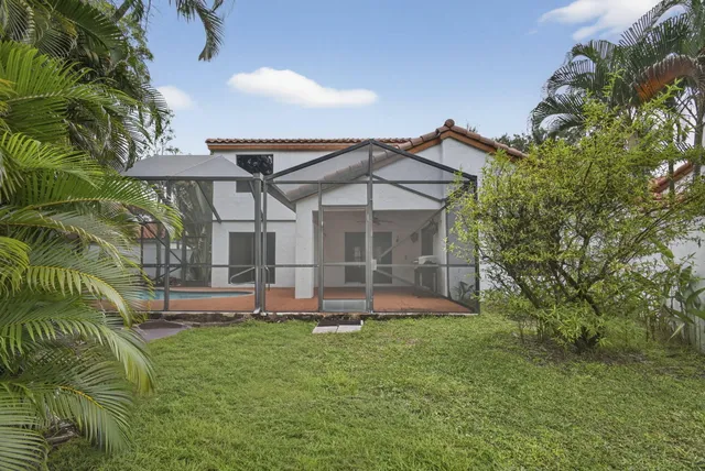 a view of yard with patio