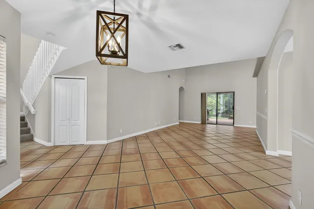 a view of an empty room and window