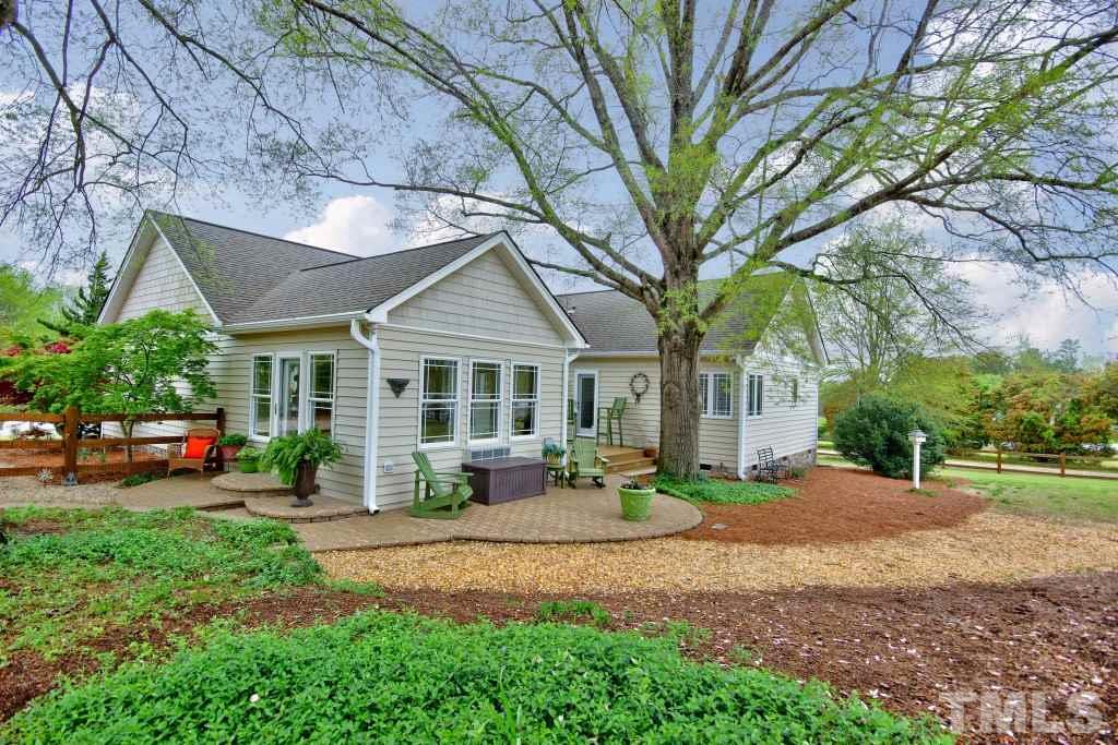 3100 McDade Farm Road Raleigh, NC 27616 - Photo 22 of 23 a front view of a house with a yard