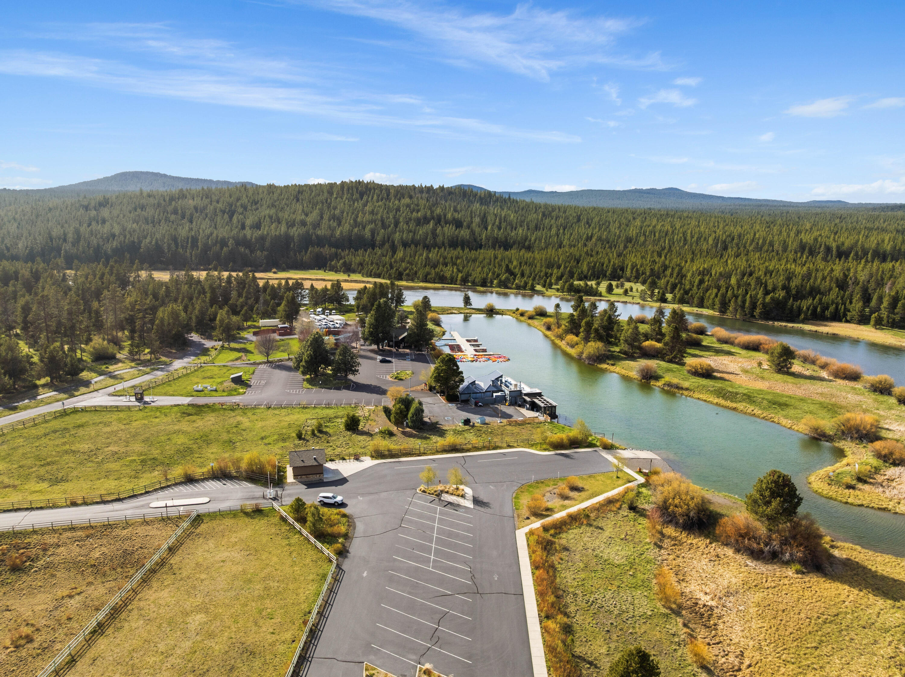 17866 Grouse Lane, Unit 3 Sunriver, OR 97707 - Photo 53 of 61 a view of a lake with a mountain