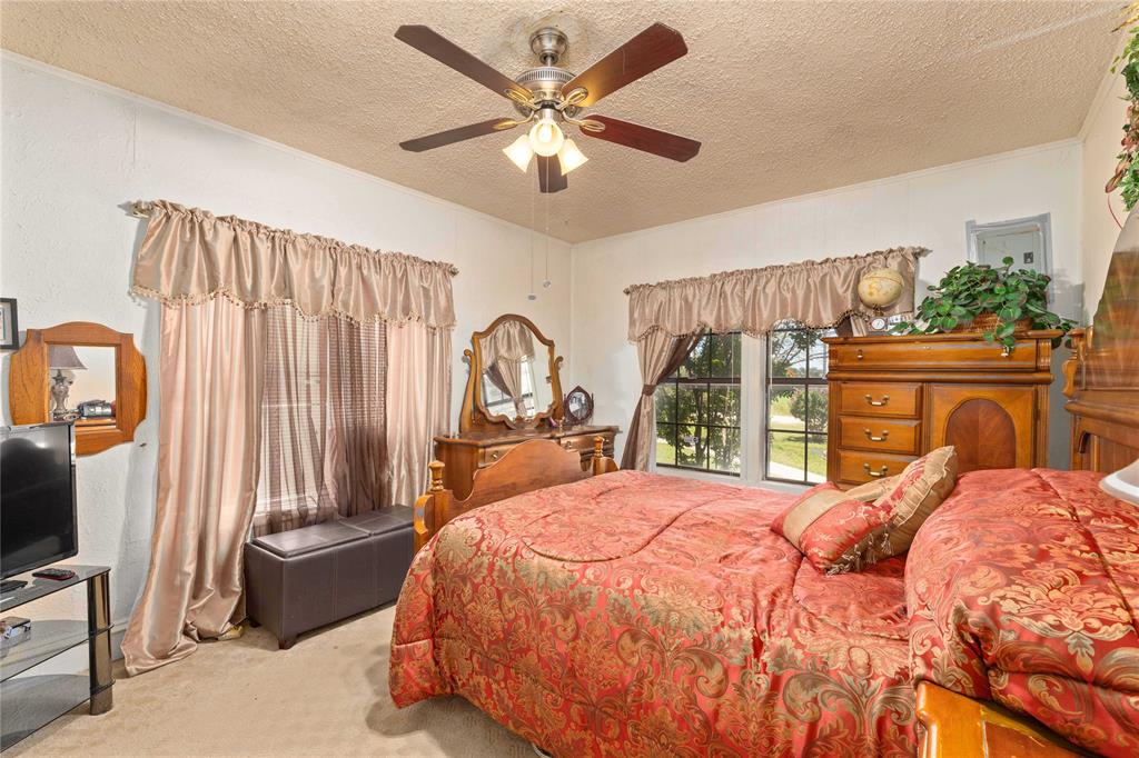 3800 County Road 112 Brownwood, TX 76801 - Photo 19 of 37 First Bedroom off of the living room.