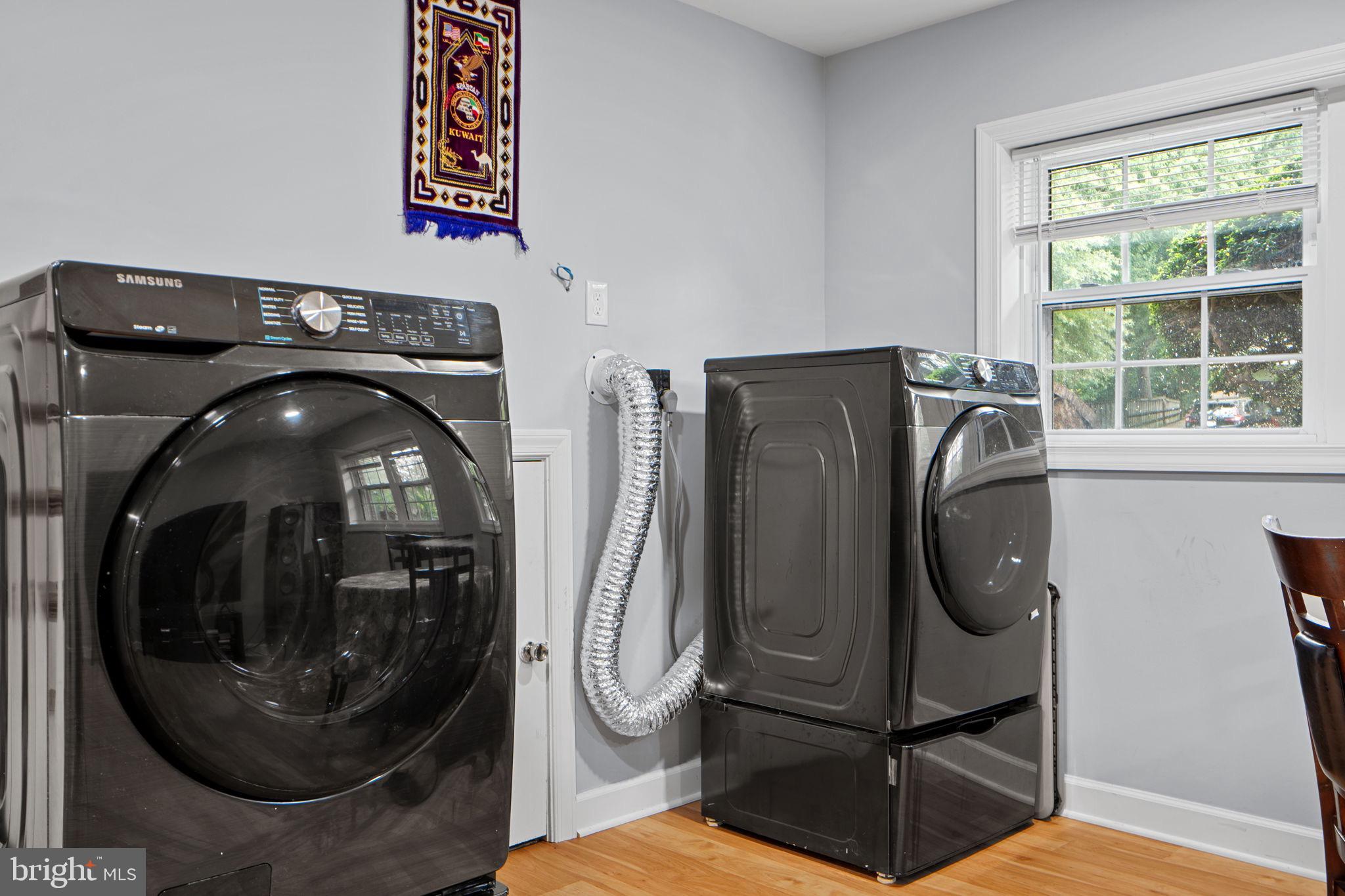 7222 Willow Oak Place Springfield, VA 22153 - Photo 25 of 34 a utility room with dryer and washer