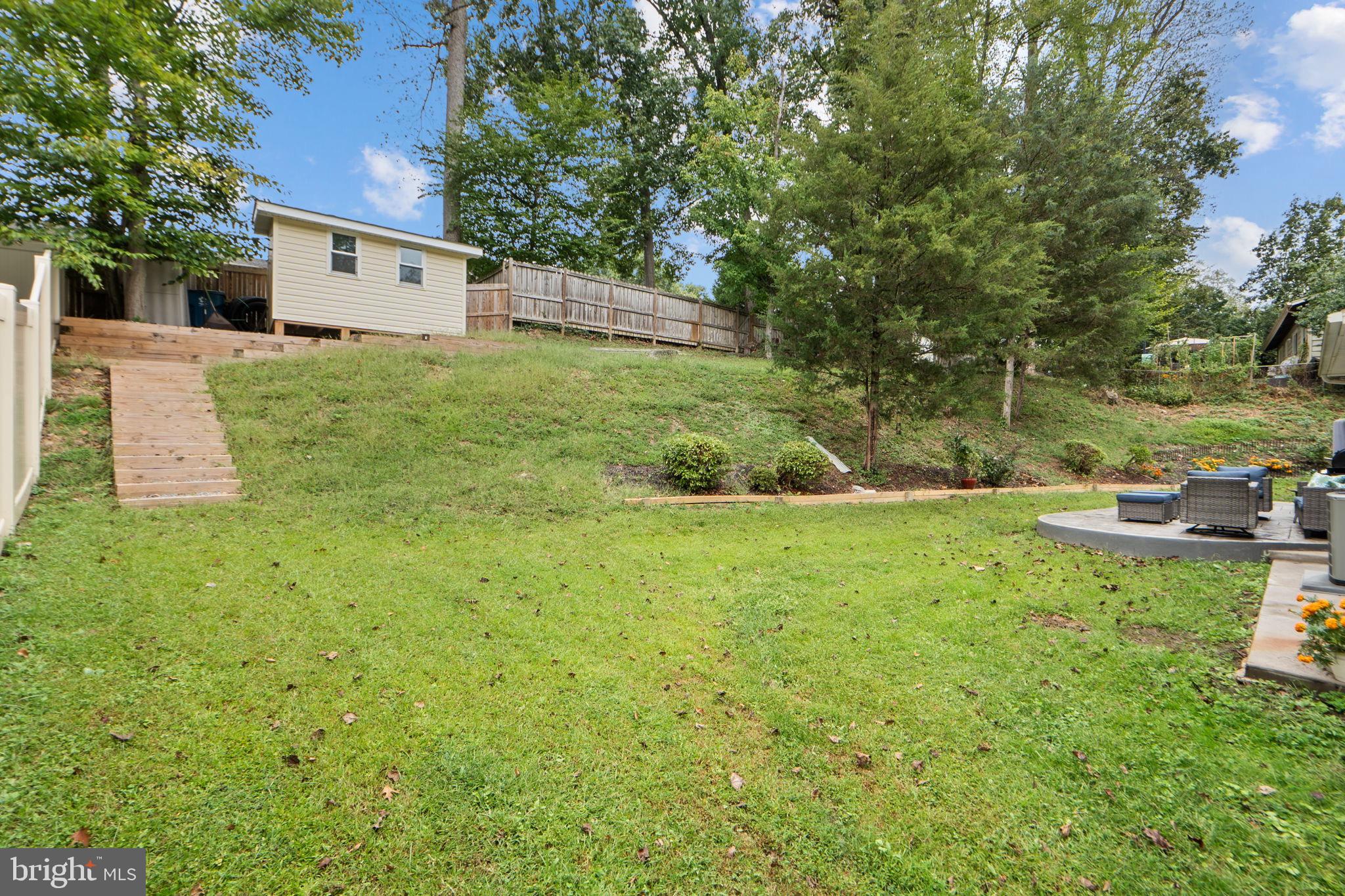 7222 Willow Oak Place Springfield, VA 22153 - Photo 29 of 34 a view of a house with a yard