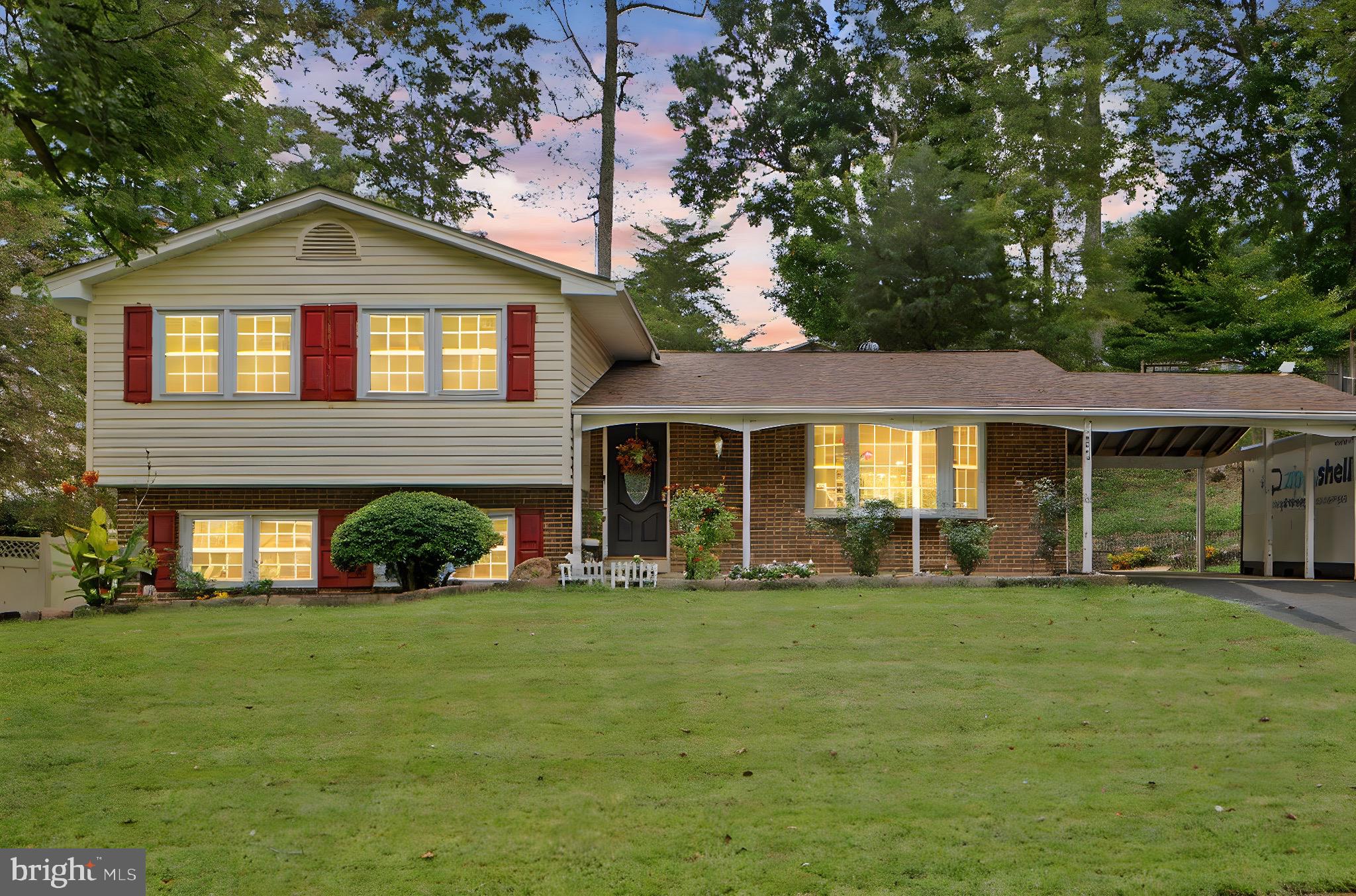 7222 Willow Oak Place Springfield, VA 22153 - Photo 34 of 34 a front view of a house with a yard