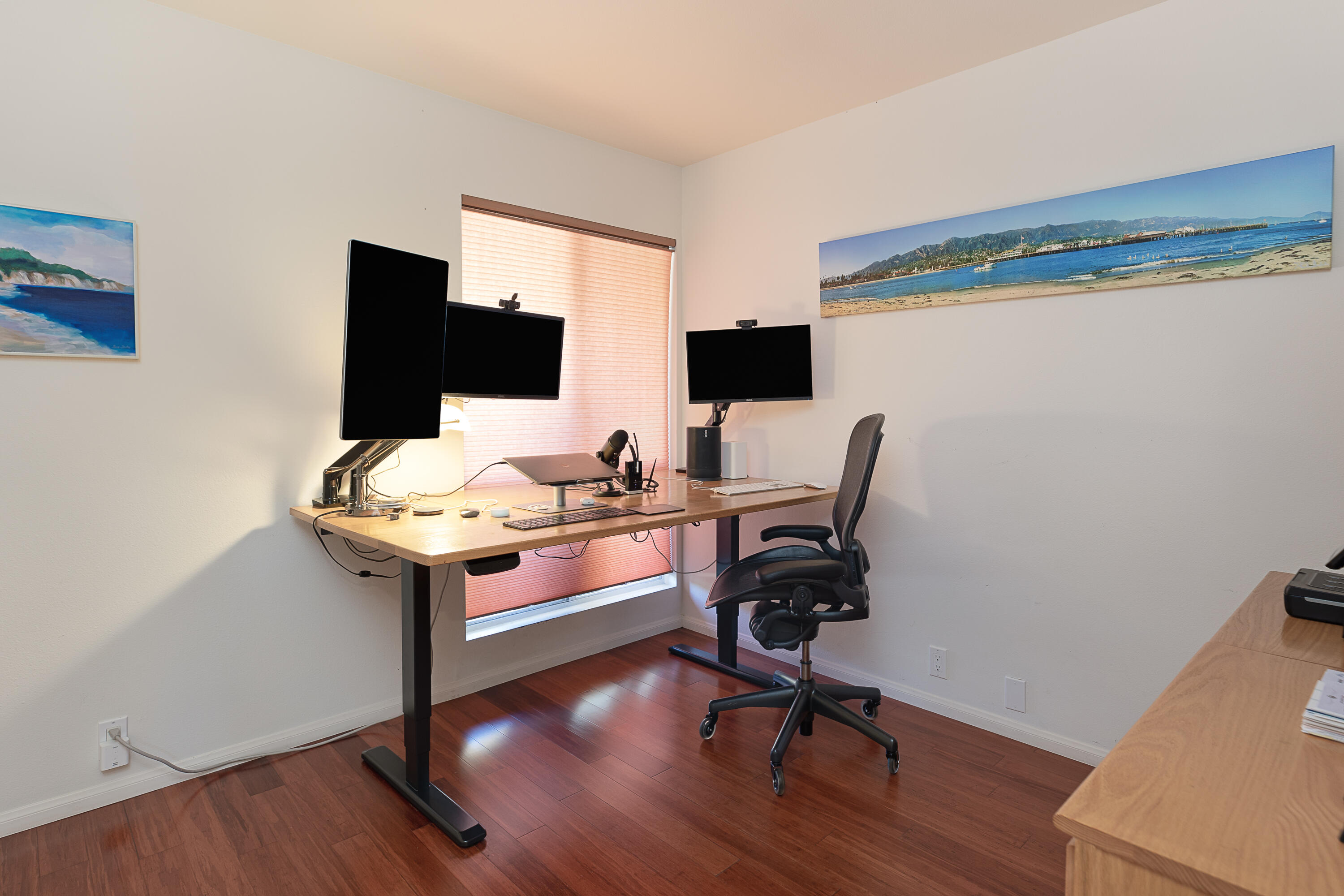 4655 Aragon Drive Carpinteria, CA 93013 - Photo 15 of 32 a view of a workspace with furniture and wooden floor