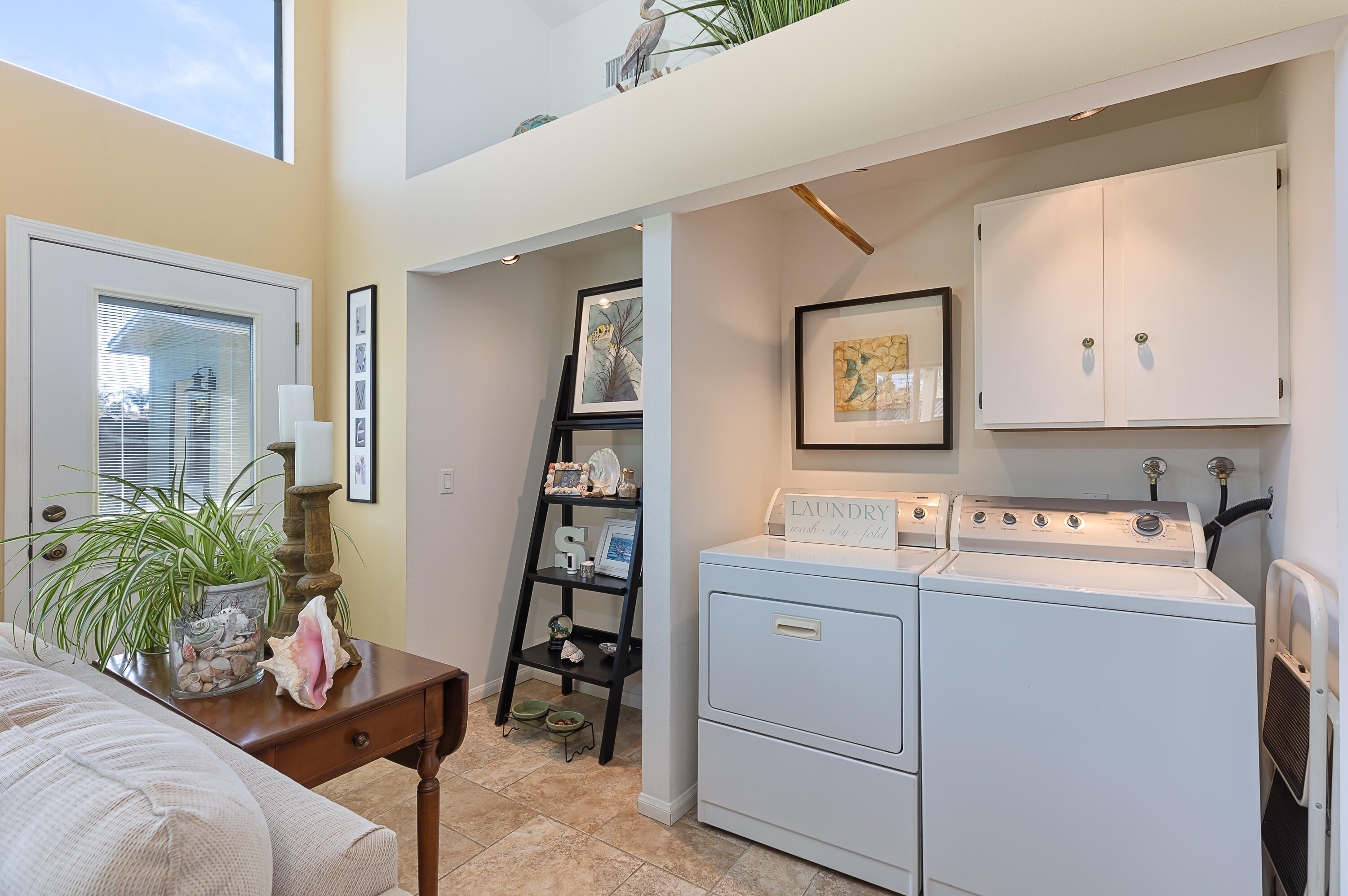 4655 Aragon Drive Carpinteria, CA 93013 - Photo 18 of 32 a room with furniture and staircase