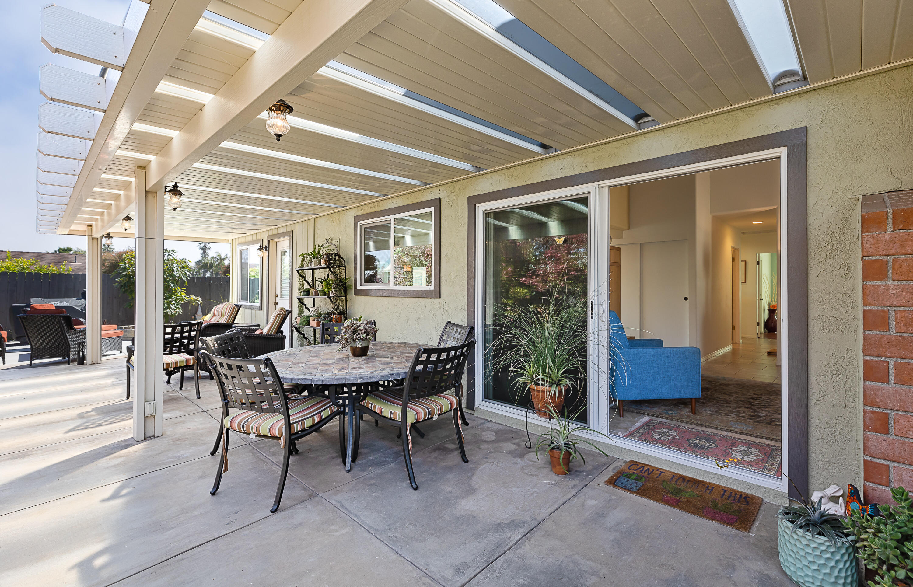 4655 Aragon Drive Carpinteria, CA 93013 - Photo 20 of 32 a dining room with furniture and glass door