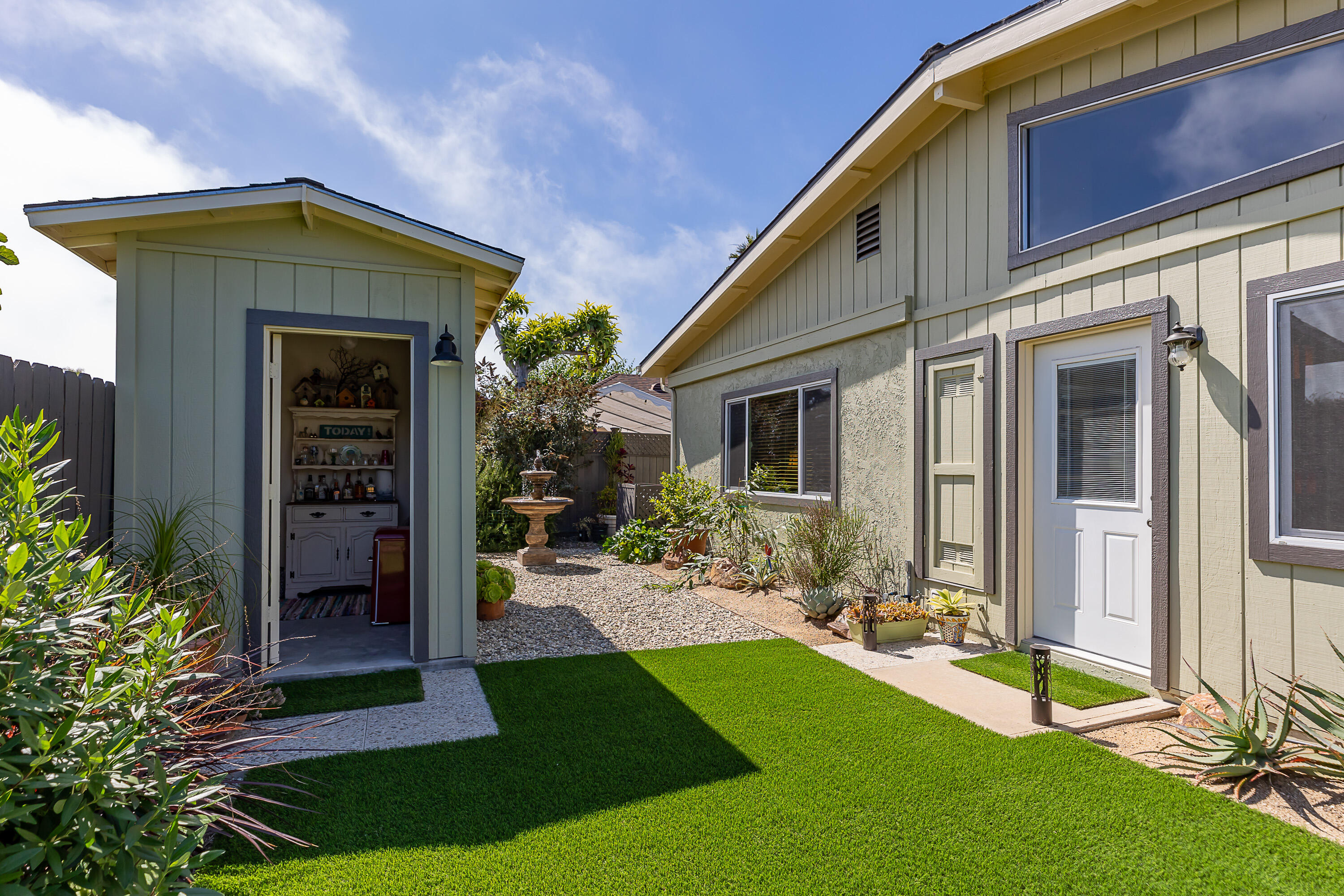 4655 Aragon Drive Carpinteria, CA 93013 - Photo 26 of 32 a view of a house with backyard porch and sitting area
