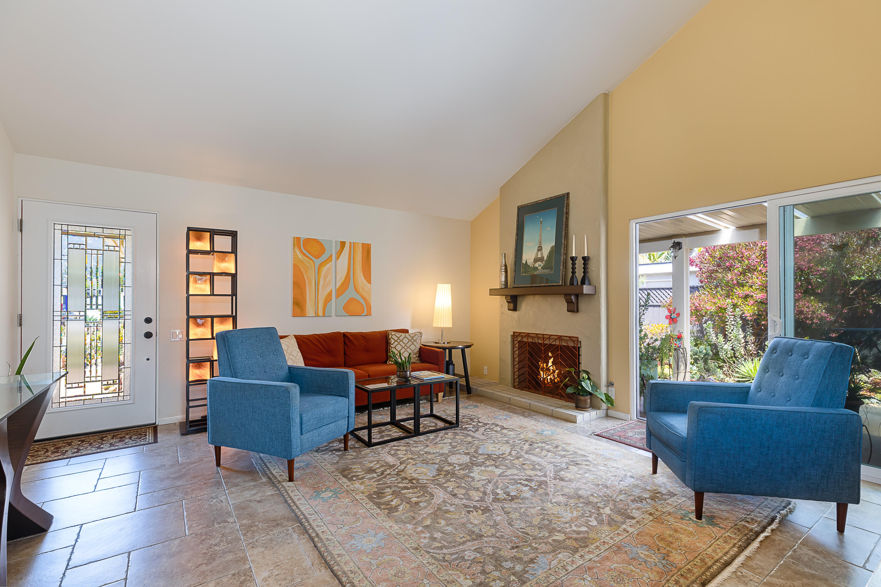 4655 Aragon Drive Carpinteria, CA 93013 - Photo 5 of 32 a living room with furniture and a fireplace