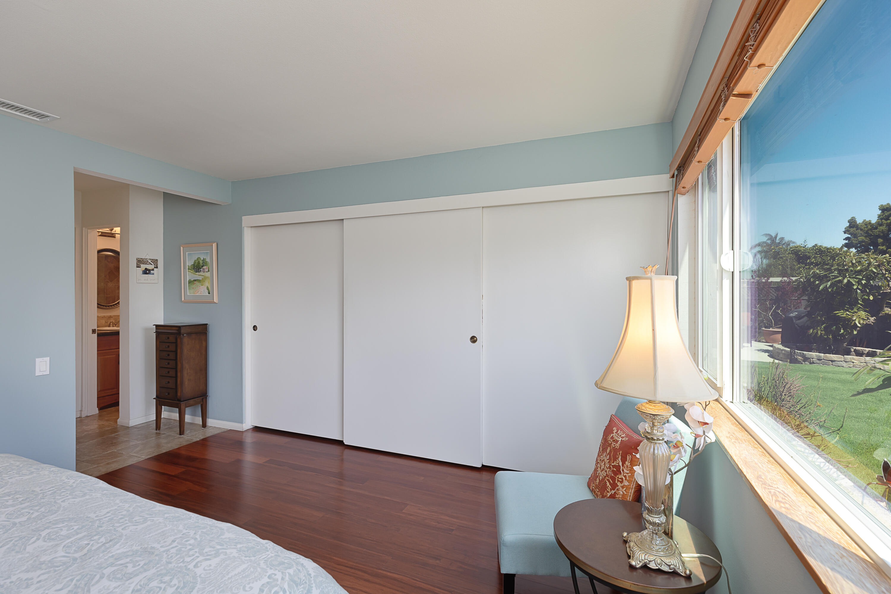 4655 Aragon Drive Carpinteria, CA 93013 - Photo 10 of 32 a living room with furniture and a floor to ceiling window