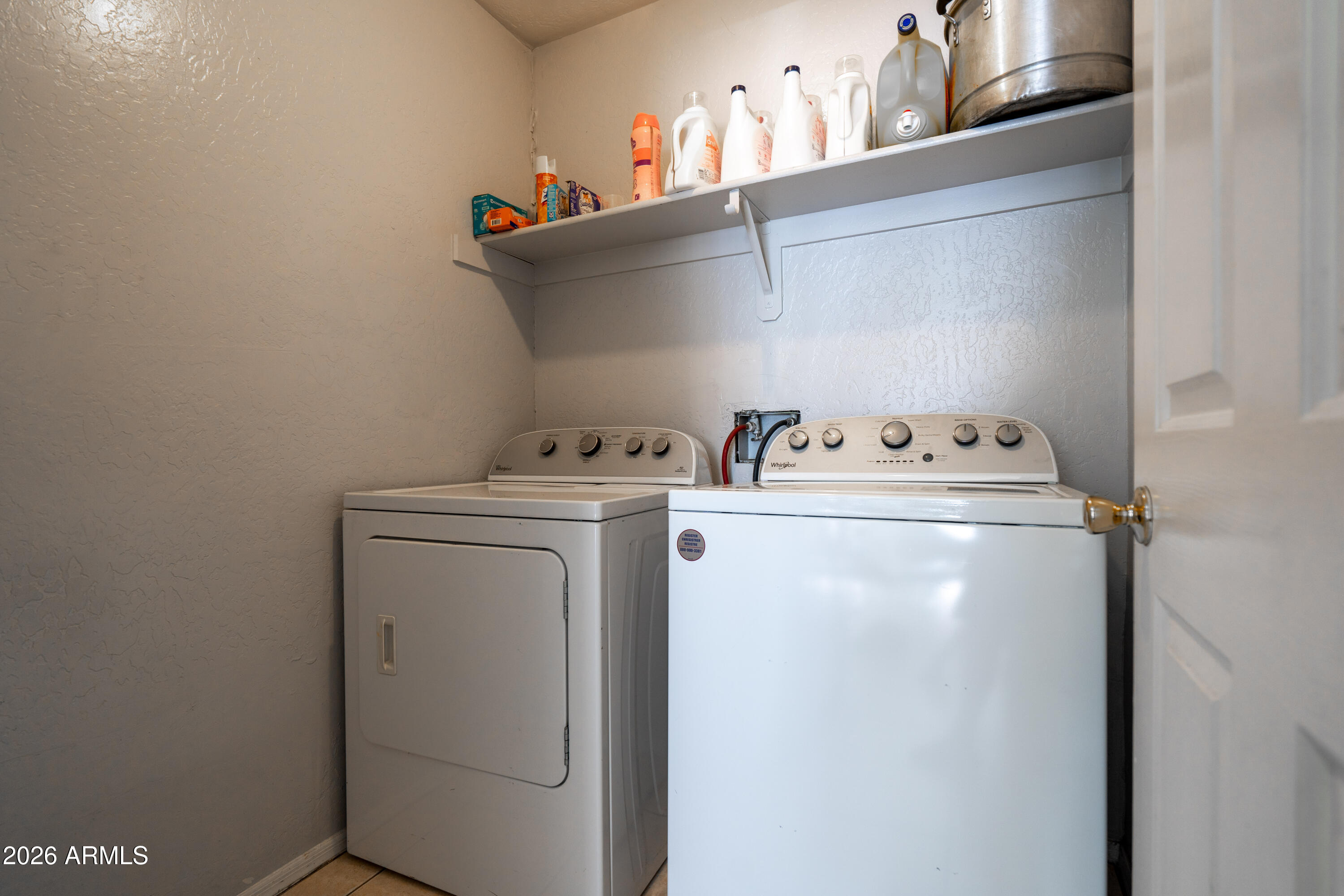 15855 South Moon Valley Road Arizona City, AZ 85123 - Photo 6 of 22 a utility room with dryer and washer