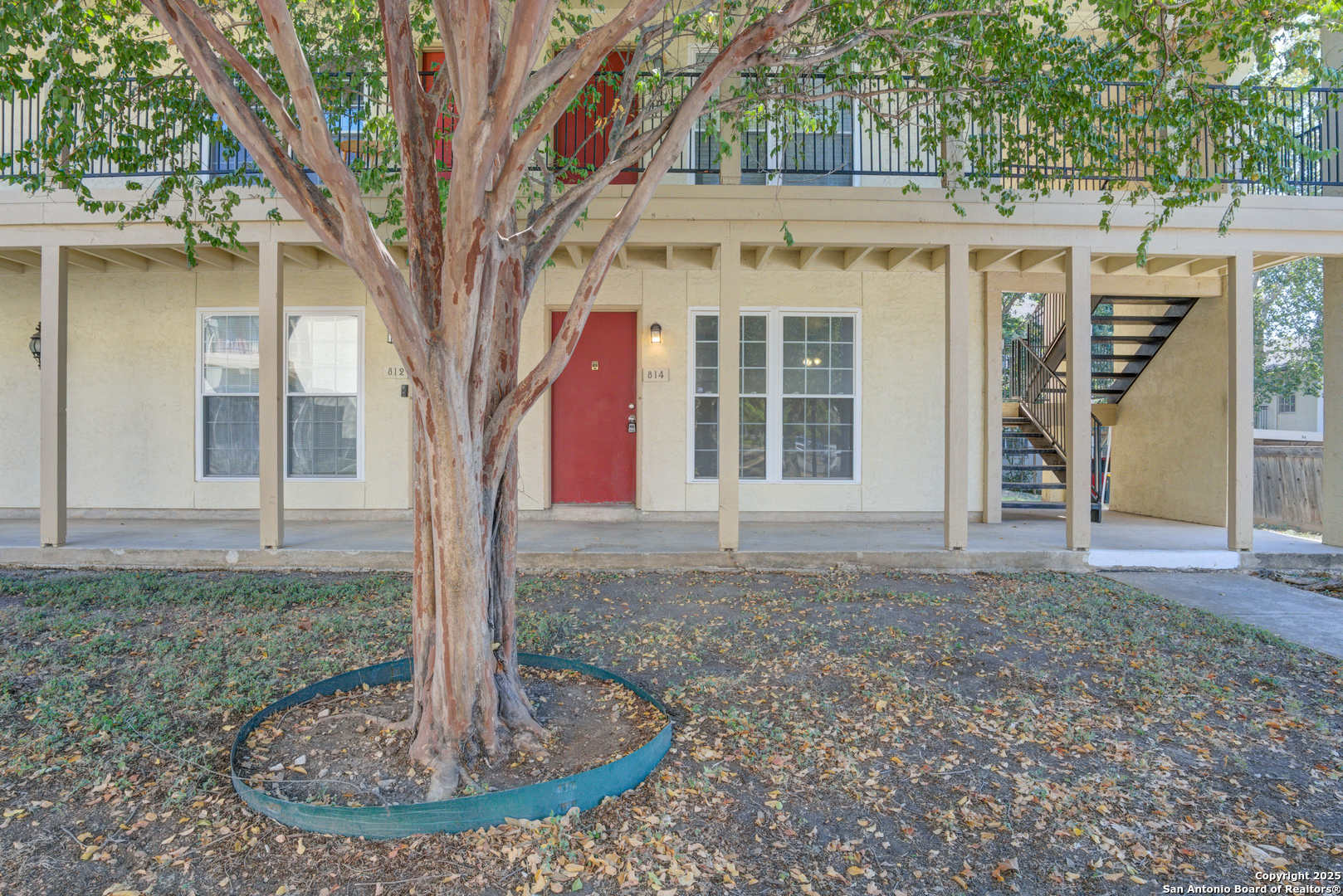 8702 Village Drive, Unit BLDG 8 814 San Antonio, TX 78217 - Photo 2 of 25 a house view with a outdoor space