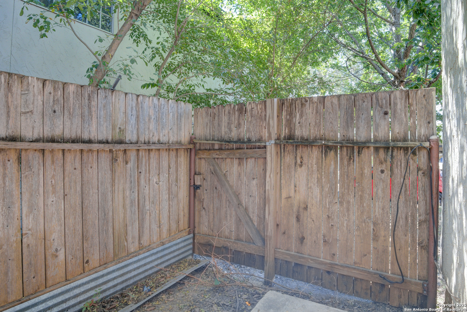 8702 Village Drive, Unit BLDG 8 814 San Antonio, TX 78217 - Photo 22 of 25 a view of wooden fence