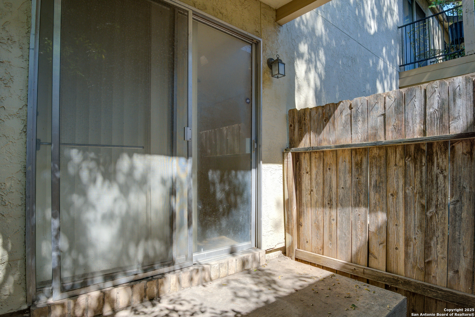 8702 Village Drive, Unit BLDG 8 814 San Antonio, TX 78217 - Photo 24 of 25 a view of a wooden door