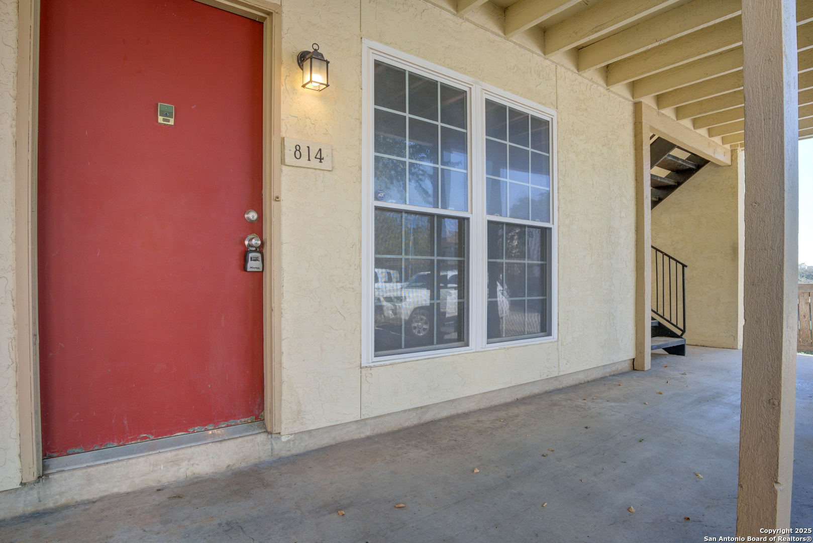 8702 Village Drive, Unit BLDG 8 814 San Antonio, TX 78217 - Photo 4 of 25 a view of an empty room with a window