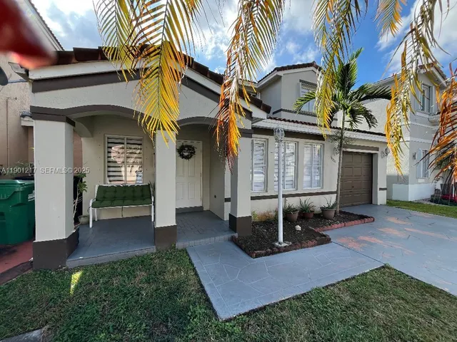 a view of a house with a patio