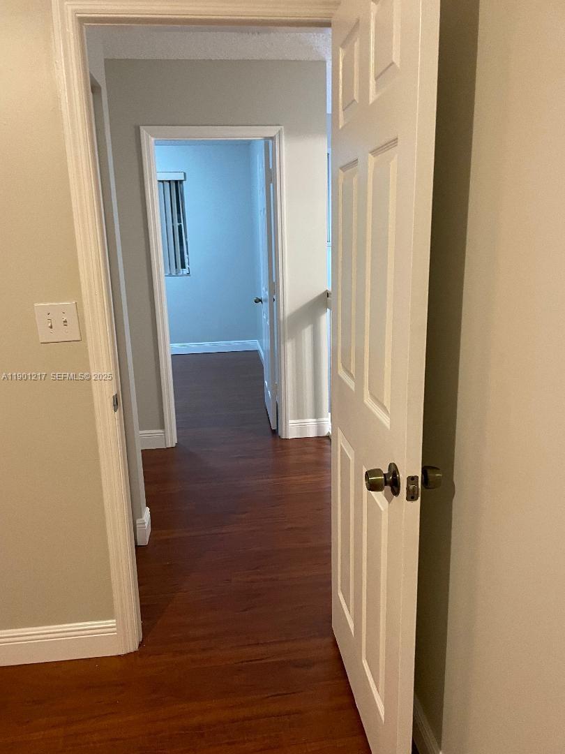 16530 Southwest 96th Terrace Miami, FL 33196 - Photo 10 of 22 wooden floor in a gallery