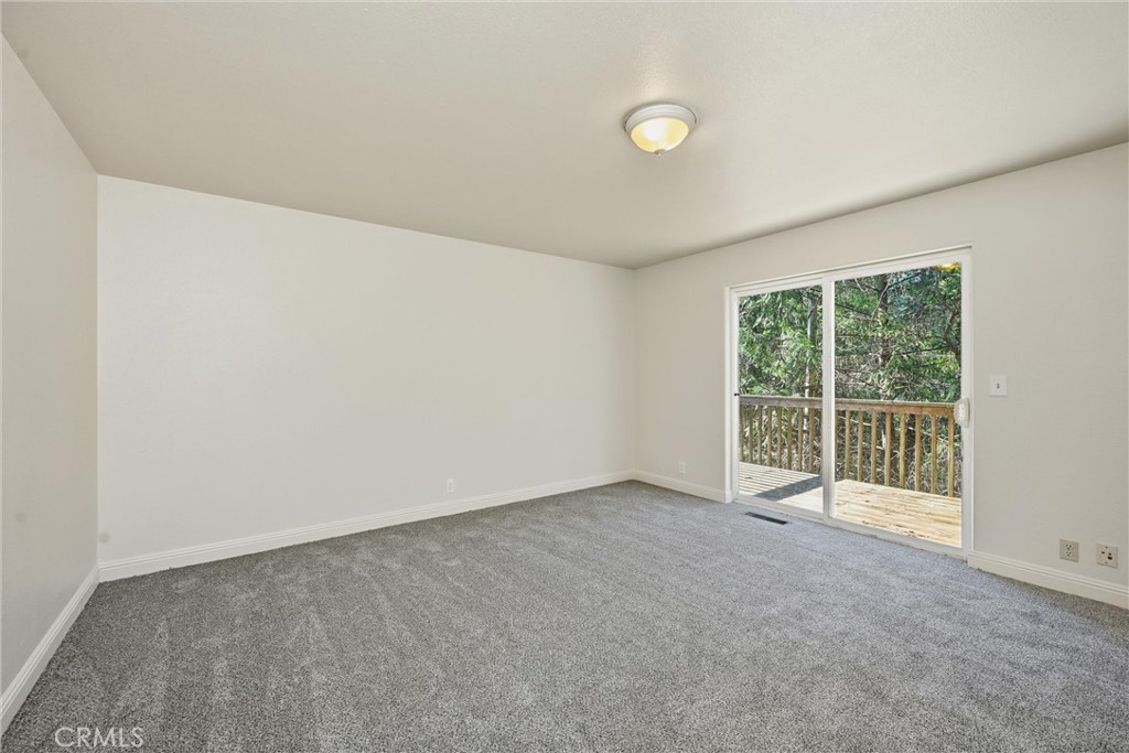 16211 Golf Middletown, CA 95426 - Photo 20 of 29 Den/playroom/hobbie room on third level with deck outside