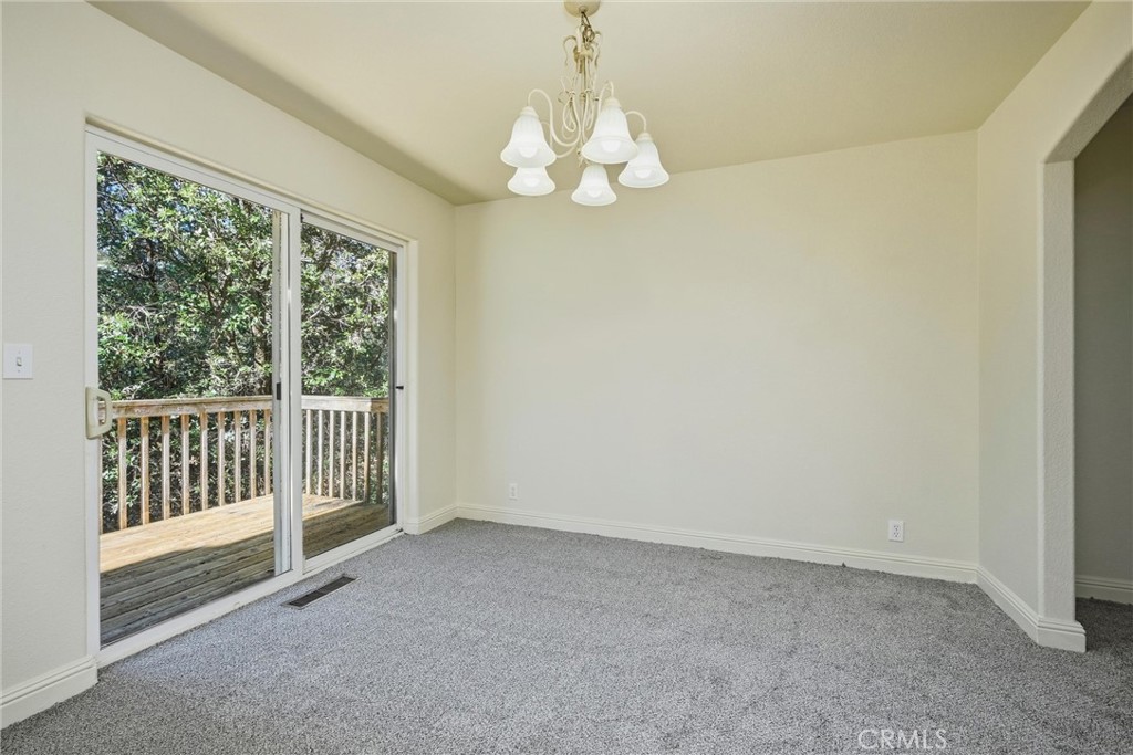 16211 Golf Middletown, CA 95426 - Photo 6 of 29 Formal Dining room with a deck out sliding doors