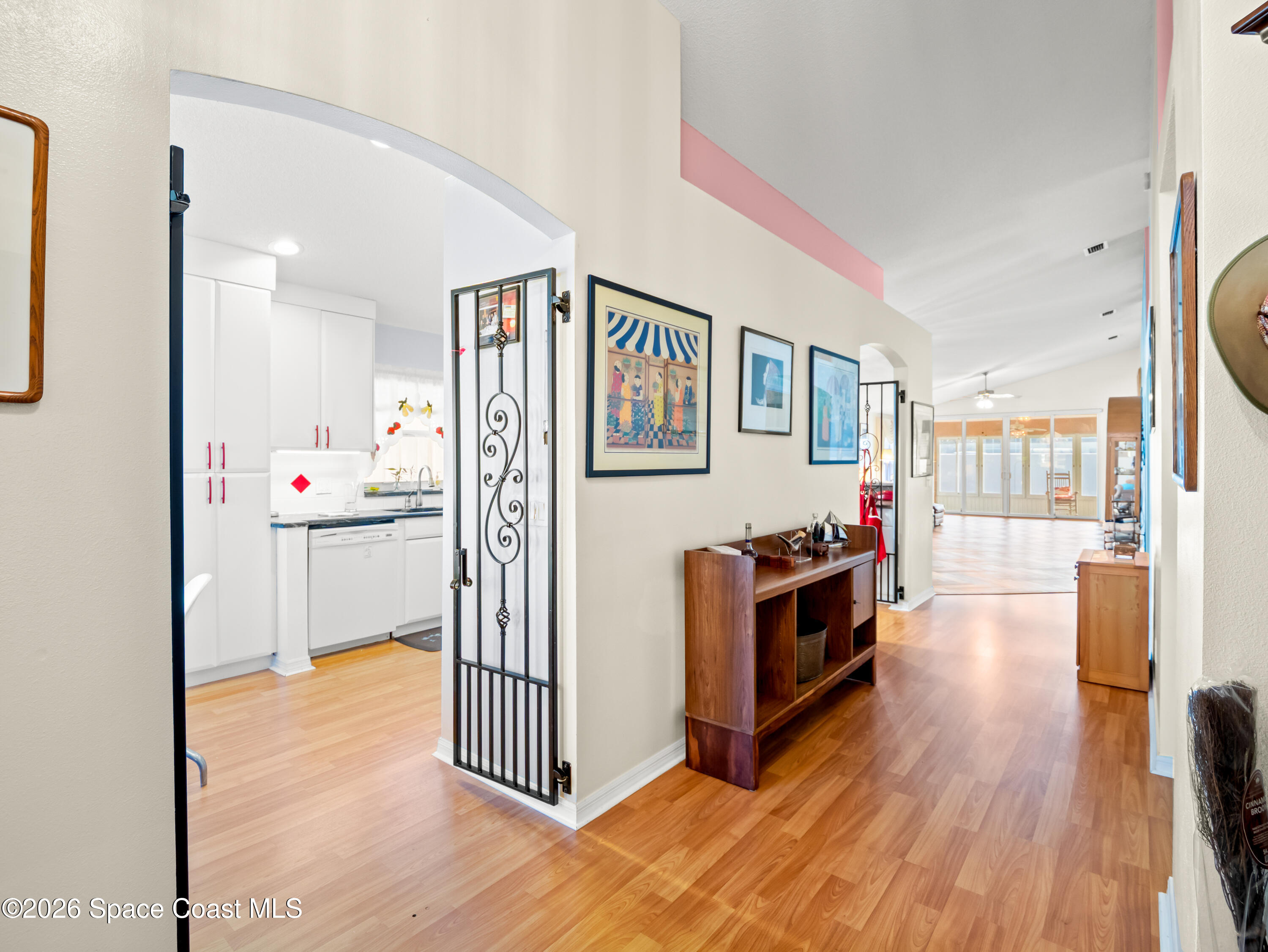 3904 St Armens Circle Melbourne, FL 32934 - Photo 33 of 38 a kitchen view with wooden floor and electronic appliances