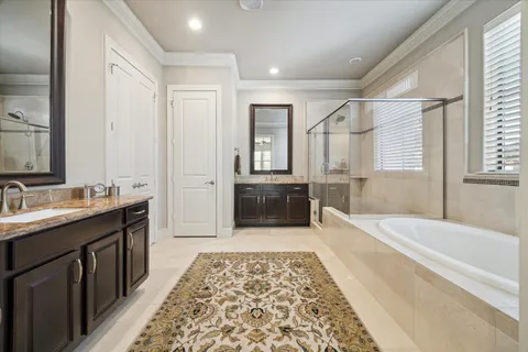 a view of staircase with wooden floor and white walls