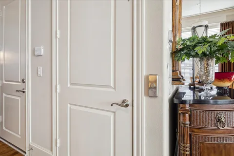 a view of a dining room with furniture and a window
