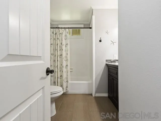1528 Reche Road Fallbrook, CA 92028 - Photo 20 of 32 a bathroom with a shower and a toilet