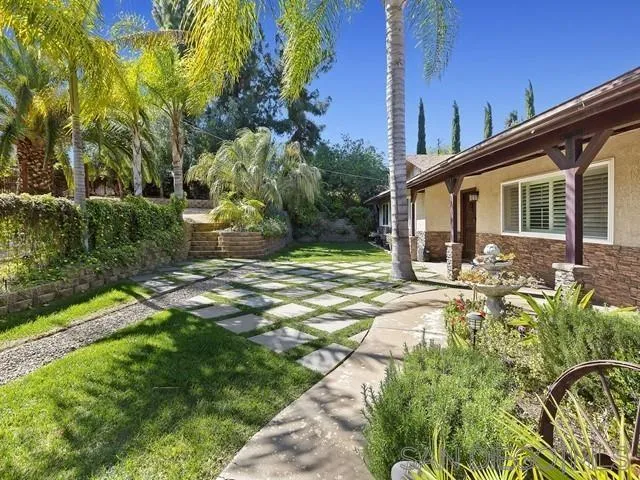 1528 Reche Road Fallbrook, CA 92028 - Photo 2 of 32 a front view of a house with garden