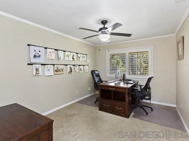 1528 Reche Road Fallbrook, CA 92028 - Photo 23 of 32 a view of a workspace with furniture and a window