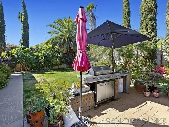 1528 Reche Road Fallbrook, CA 92028 - Photo 28 of 32 a view of a backyard with sitting area and furniture