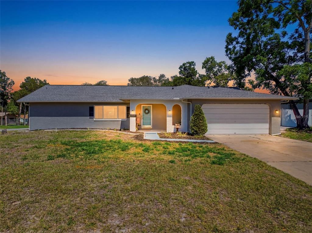 a view of a house with garden