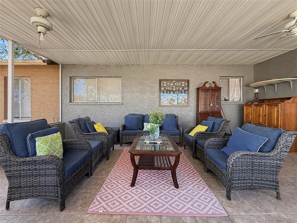 Undisclosed Address Spring Hill, FL 34608 - Photo 37 of 54 a living room with furniture and a couch