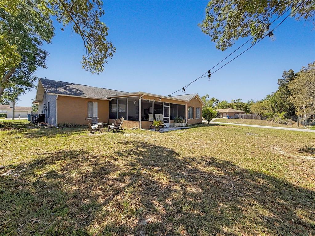 Undisclosed Address Spring Hill, FL 34608 - Photo 42 of 54 a view of swimming pool with outdoor seating