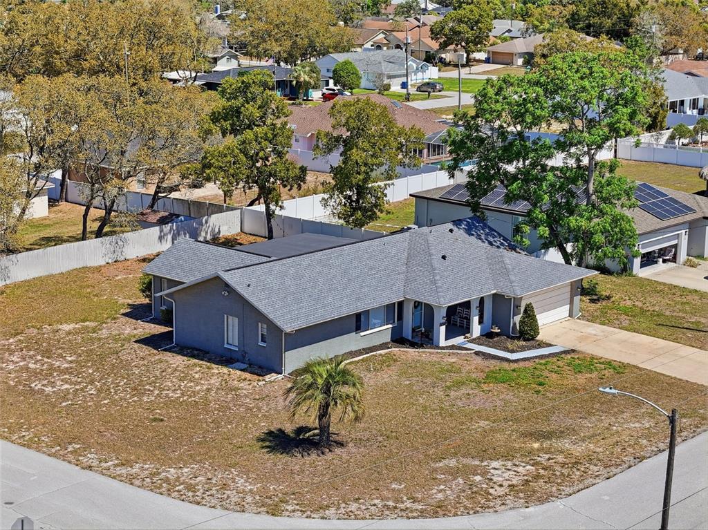Undisclosed Address Spring Hill, FL 34608 - Photo 52 of 54 an aerial view of a house with entertaining space