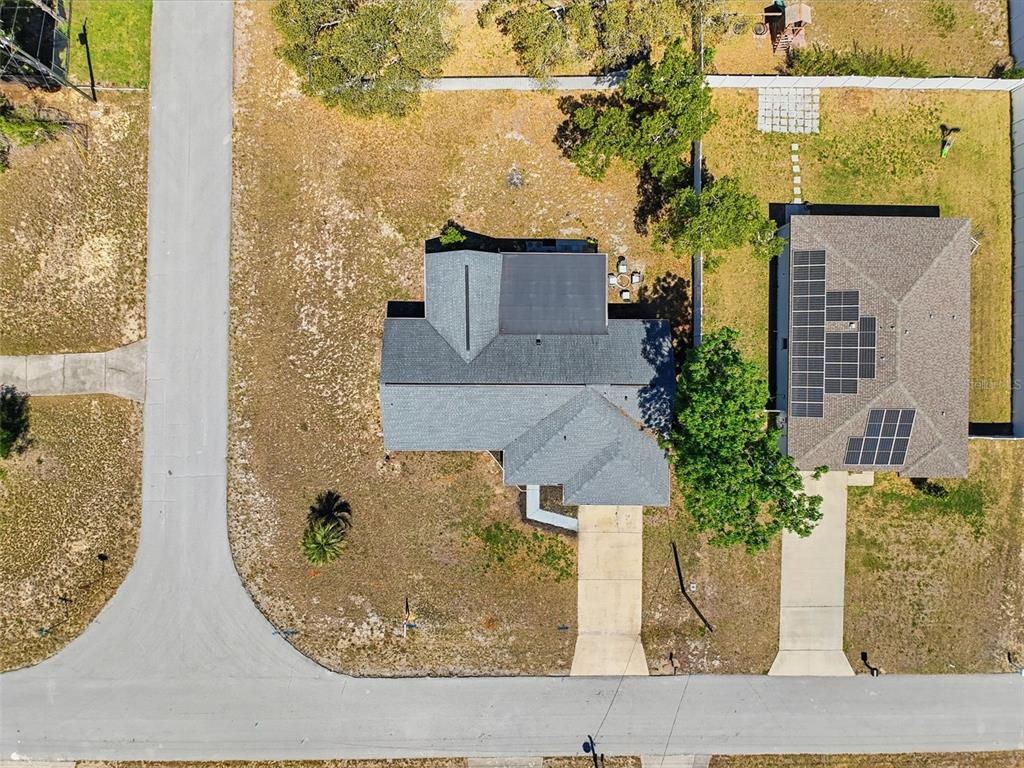 Undisclosed Address Spring Hill, FL 34608 - Photo 54 of 54 front view of a house with a fountain