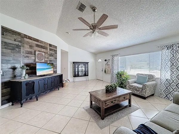 a kitchen with sink cabinets and window