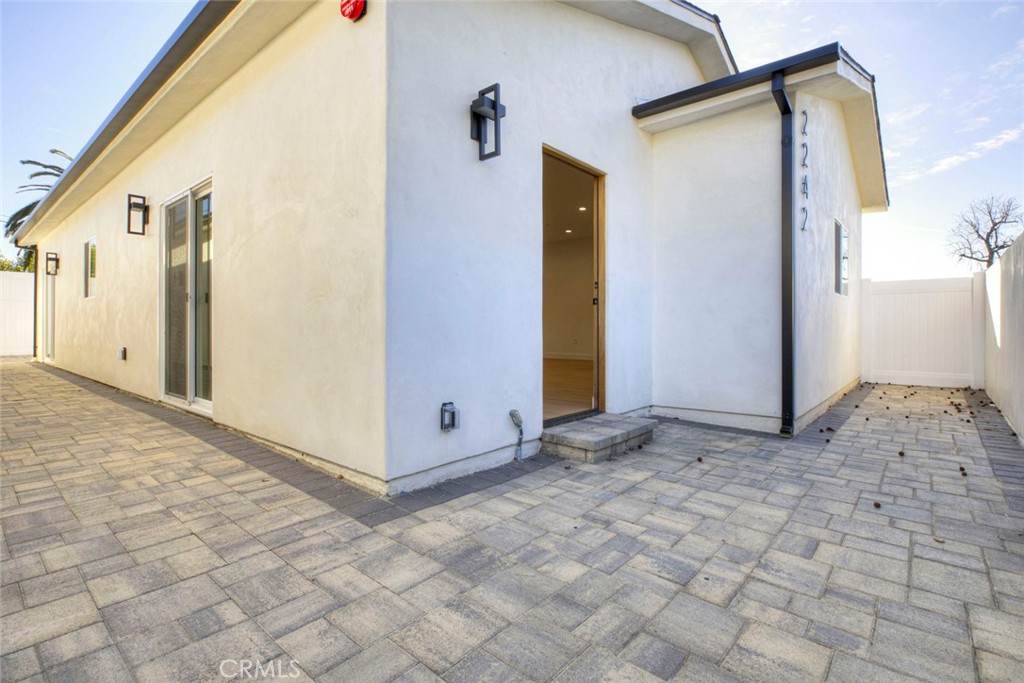 2242 North Keystone Street Burbank, CA 91504 - Photo 4 of 26 a view of a bathroom with a sink and a mirror