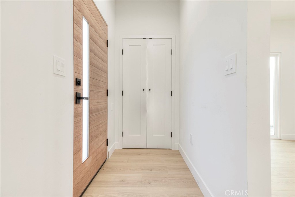 2242 North Keystone Street Burbank, CA 91504 - Photo 5 of 26 a view of a hallway with wooden floor