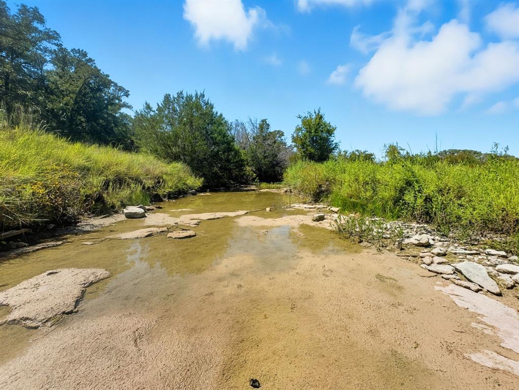 2902 Hamilton Tx 76531 Hamilton, TX 76531 - Photo 3 of 14 a view of swimming pool with an outdoor seating area