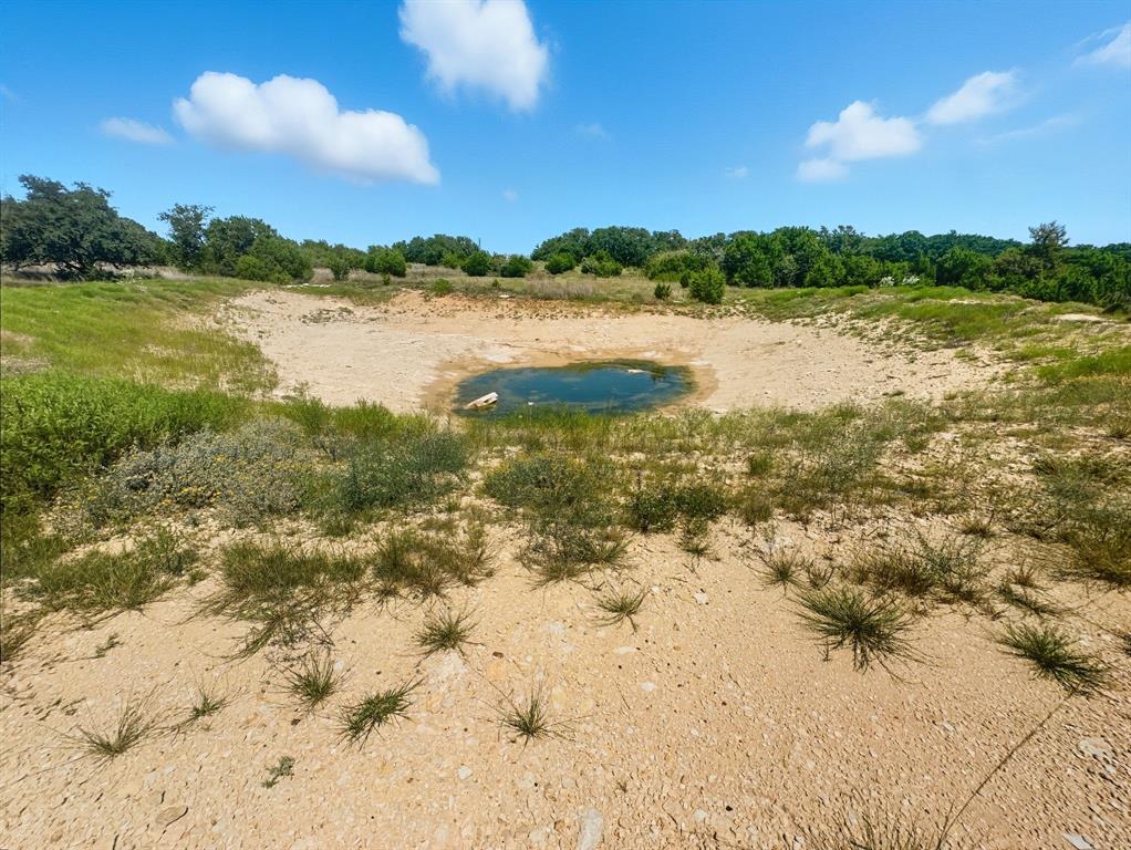 2902 Hamilton Tx 76531 Hamilton, TX 76531 - Photo 8 of 14 a view of lake with mountain