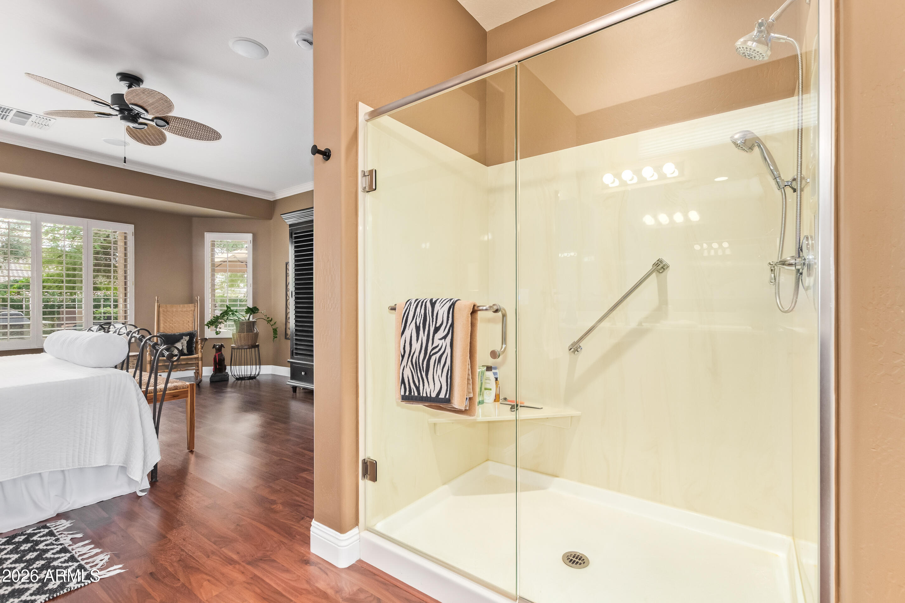 16287 West Cheery Lynn Road Goodyear, AZ 85395 - Photo 20 of 44 a very nice looking living room with a large window and wooden floor
