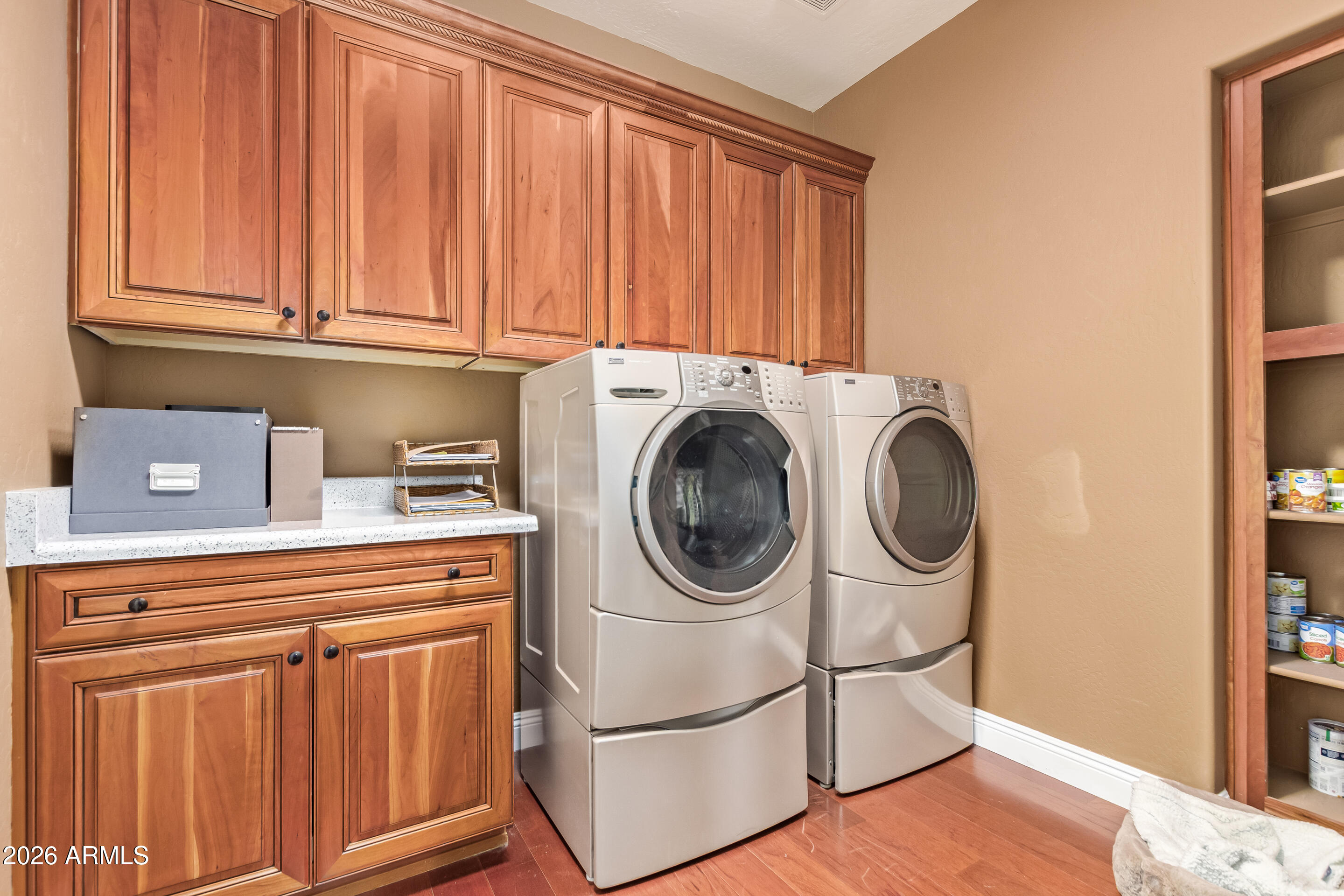 16287 West Cheery Lynn Road Goodyear, AZ 85395 - Photo 24 of 44 a utility room with dryer and washer