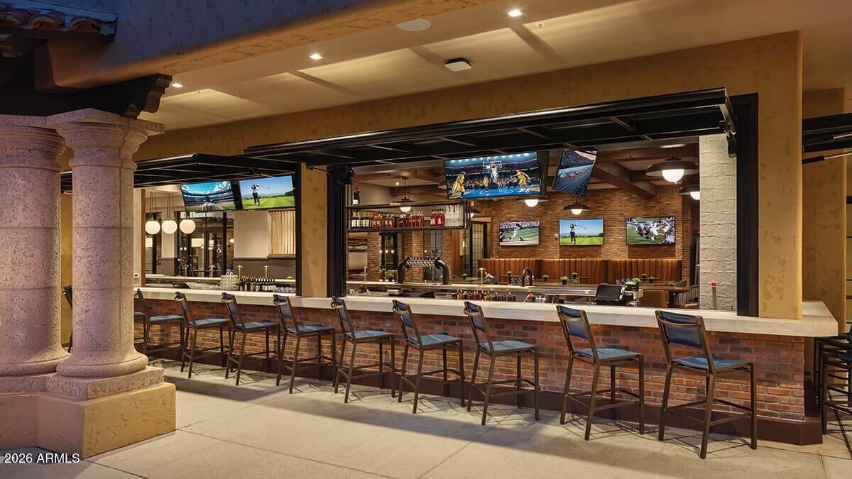 16287 West Cheery Lynn Road Goodyear, AZ 85395 - Photo 31 of 44 a room with lots of table and chairs