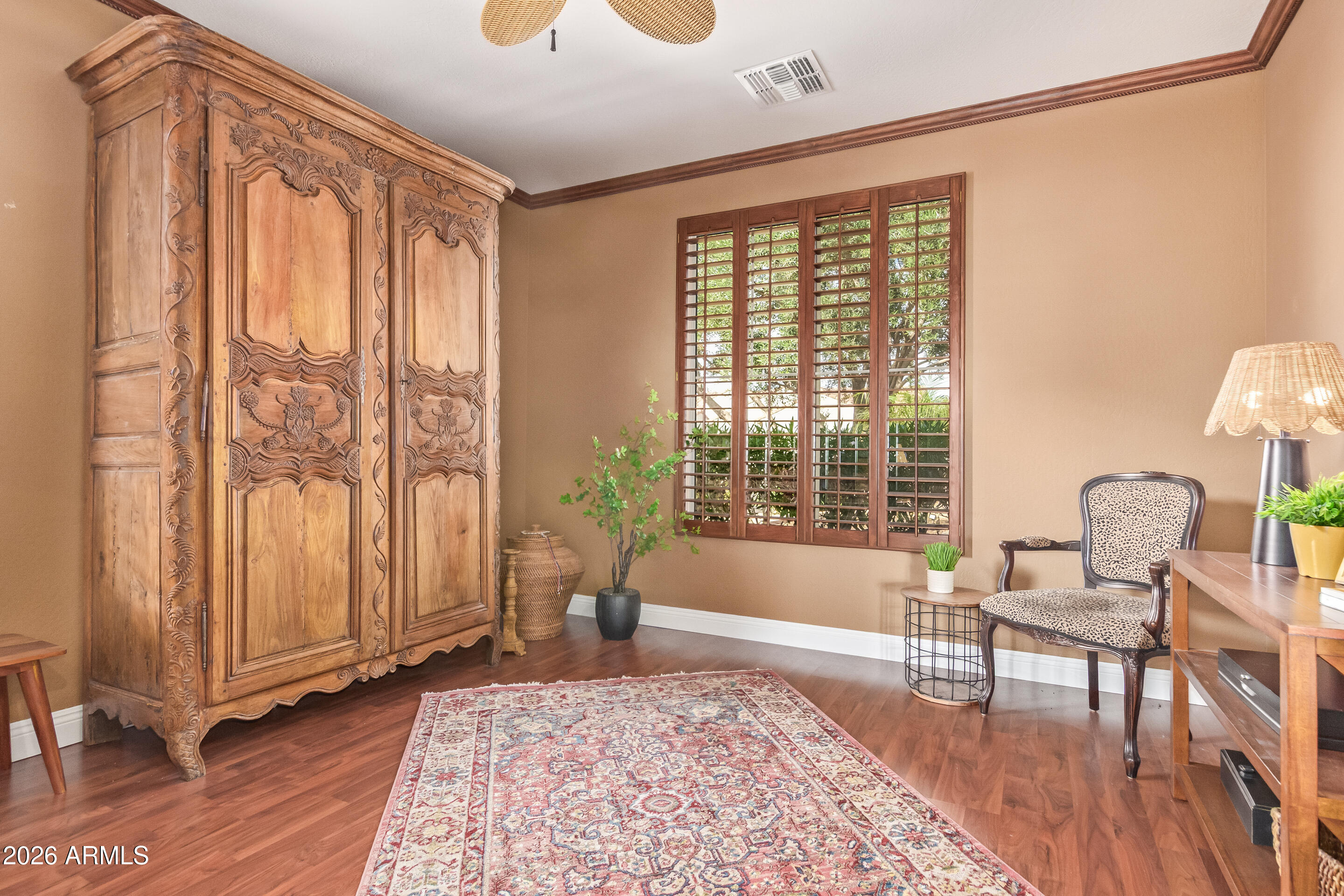 16287 West Cheery Lynn Road Goodyear, AZ 85395 - Photo 6 of 44 a living room with furniture and wooden floor