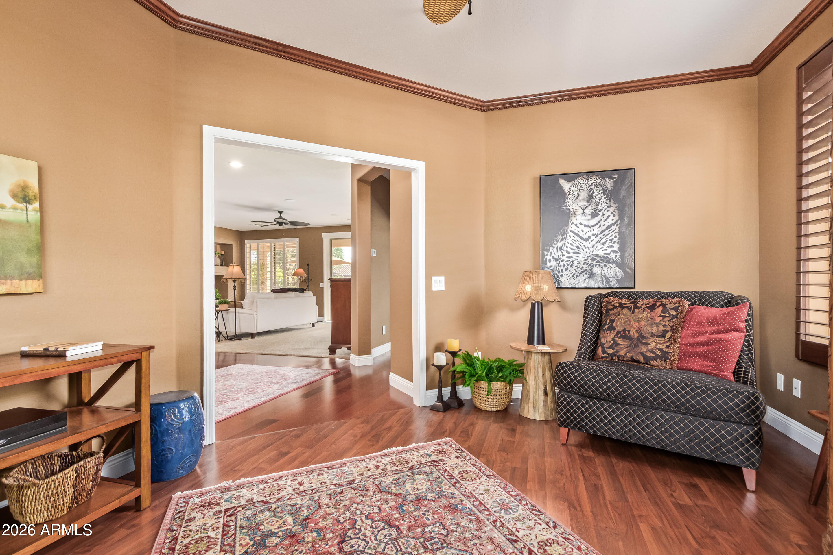 16287 West Cheery Lynn Road Goodyear, AZ 85395 - Photo 7 of 44 a living room with furniture and wooden floor
