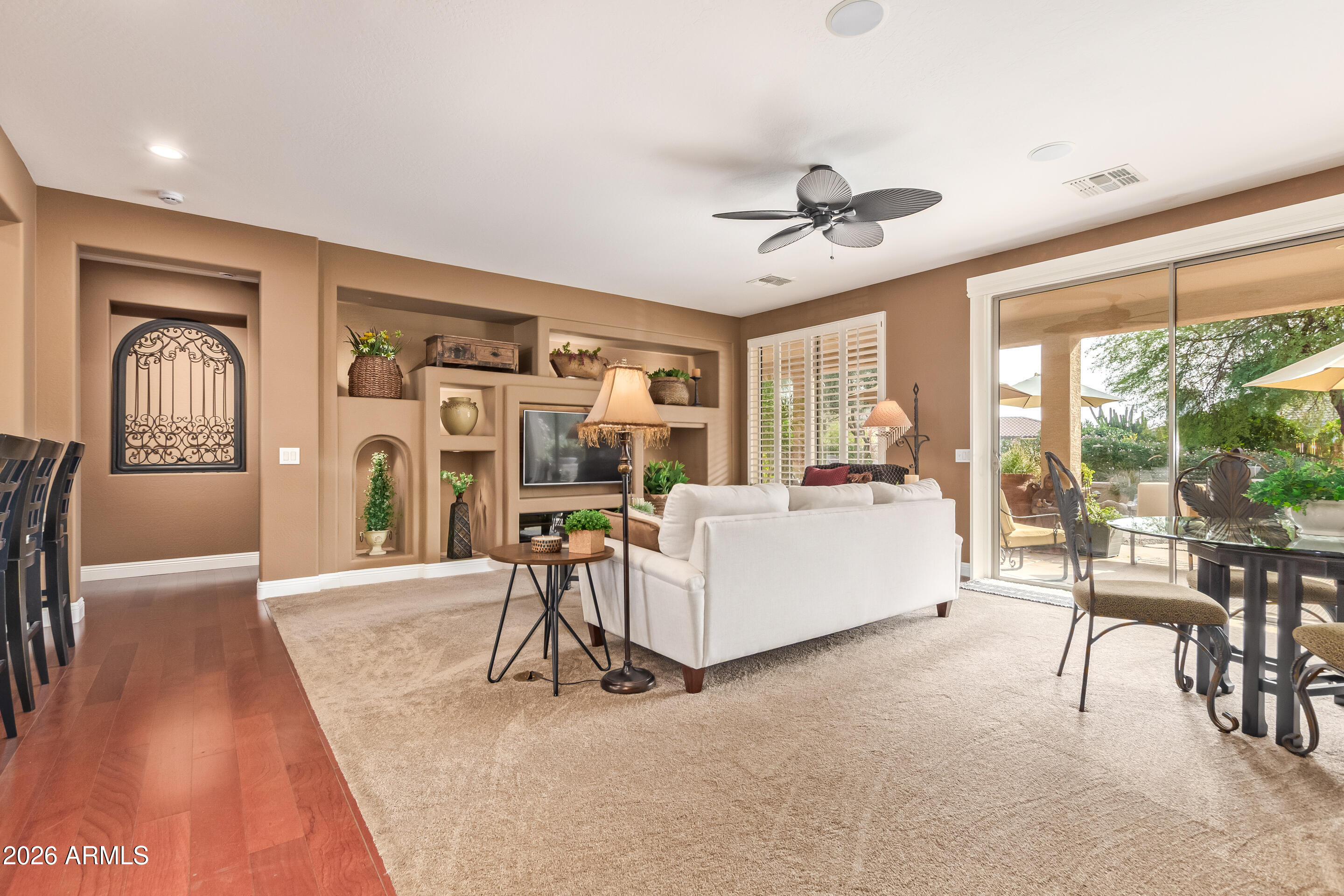 16287 West Cheery Lynn Road Goodyear, AZ 85395 - Photo 8 of 44 a living room with furniture and a large window