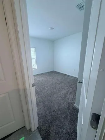 a view of hallway with window