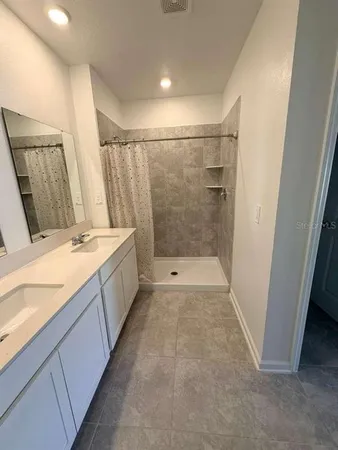 a bathroom with a sink and a toilet